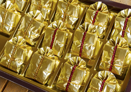 Pack of pineapple cake in plastic wrappingの写真素材