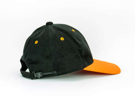 Orange and black color hat isolated on white backgroundの写真素材