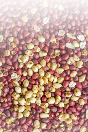 Roasted peanuts background with white color filter effect