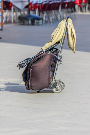 Travelling bag on streetの写真素材