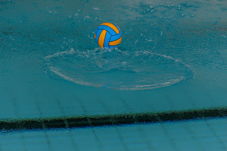 water polo ball in a swimming poolの写真素材