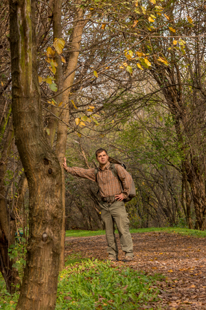 man enjoying in nature with backpackの写真素材