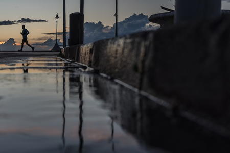 runner in the sunsetの写真素材