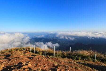 "sea of mist"seen from Phu Chi Fa(a mountain area and national forest park in Thailand,a part of Doi Pha Mon,located at the northeastern end of Phi Pan Nam Range,Thoeng District,Chiang Rai Province.の写真素材