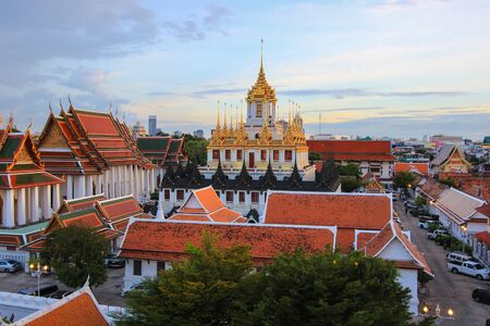evening at Wat Ratchanatdaram Woravihara (Loha Prasat) - buddhist temple located at the intersection...