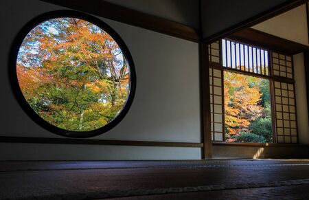 the view of fall colors through the windows at Genko-an Temple,Kita Ward,Kyoto,Japanのeditorial素材