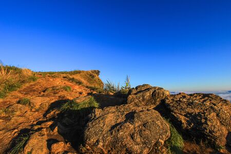 Sunny day at Phu Chi Fa(a mountain area and national forest park in Thailand,a part of Doi Pha Mon,located at the northeastern end of Phi Pan Nam Range,Thoeng District,Chiang Rai Province)の写真素材