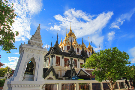 Sunny day at Loha Prasat, Wat Ratchanaddaram Woravihara (buddhist temple located at the intersection between Ratchadamnoen Klang and Maha Chai Road,Bangkok, Thailand. Also called the 'Metal Castle'のeditorial素材