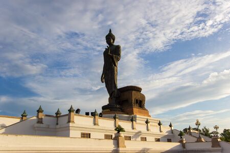 blue sky at  Phutthamonthon(Buddhist park in Phutthamonthon district,Nakhon Pathom Province of Thailand)Non-English language at the base is the name of the statue "Phra Si Sakkaya Thotsaphonlayan"の写真素材
