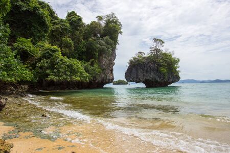 Crystal clear sea water,pleasant and shady atmosphere at Phak Bia Island,Ao Luek District, Krabi,Thailandの写真素材