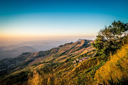 Morning sky,thin fog and mountain ranges seen from Phu Tubberg,Petchabun province,Thailandの写真素材