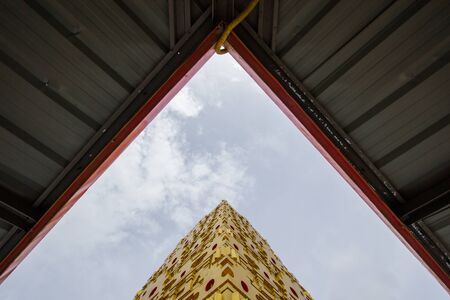 Golden Puttakaya chedi(pagoda) in Sangkhlaburi district,Kanchanaburi,Thailand.の写真素材