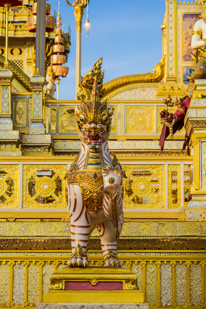 Exhibition on royal cremation ceremony of His Majesty King Bhumibol Adulyadej,Sanam Luang Ceremonial Ground,Bangkok,Thailand on November25,2017:Sculptures of mythical creatures surround the Royal Crematoriumのeditorial素材