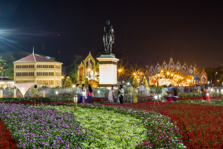 Royal winter festival,"Oon Ai Rak Klay Kwam Nao",Royal Plaza,Dusit Palace and Sanam Suea Pa,Bangkok,Thailand on February16,2018:Equestrian Statue of King Chulalongkorn and colorful flowers.のeditorial素材