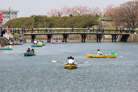 Hakodate,Hokkaido,Japan on April 29,2018:Tourists enjoyed paddling the boats and cherry blossom viewings at Fort Goryokaku in spring.のeditorial素材