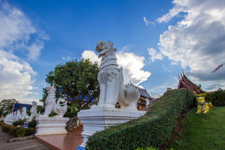 Inthakhin Subdistrict,Mae Taeng District,Chiang Mai Province,Northern Thailand on November 20,2017:White Chinthe(mythological lions) at the entrance of Wat Bandensali Si Mueang Kaen(Wat Banden)のeditorial素材