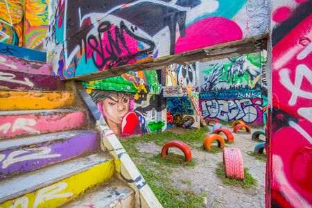 Bangkok, Thailand - November 20, 2018 : Colorful graffiti walls at Chalermla Public Park on Phayathai Rd., next to Hua Chang Bridge, near BTS Ratchathewi Station.のeditorial素材