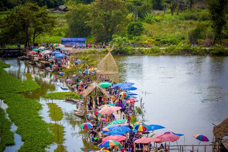 Suphanburi, Thailand - December 15, 2018 : Bird's-eye view of the market seen from giant fish trap viewpoint.のeditorial素材