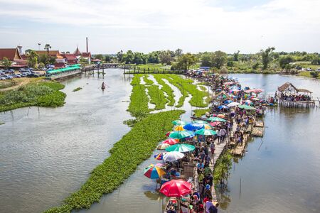 Suphanburi, Thailand - December 15, 2018 : Bird's-eye view of the market seen from giant fish trap viewpoint.のeditorial素材
