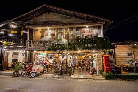Loei, Thailand - DEC 22, 2018 : Chiang Khan walking street,with wooden houses hosting many shops selling products made in Thailandのeditorial素材