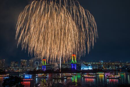 Odaiba, Minato, Tokyo, Japan on December 7, 2019 : Rainbow Bridge as a perfect backdrop for fireworks during Odaiba Rainbow Winter Fireworks 2019.のeditorial素材