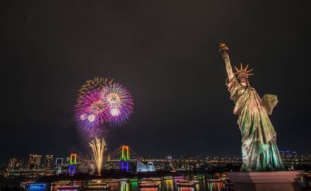Odaiba,Minato,Tokyo,Japan on December7,2019:Rainbow Bridge as a perfect backdrop for fireworks during Odaiba Rainbow Winter Fireworks 2019.のeditorial素材