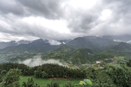 Morning fog,cloudy sky and mountain ranges in Sapa,Lao Cai Province,north-west Vietnam.の写真素材