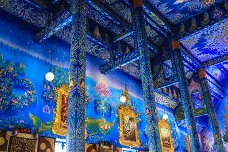 Rimkok district,Chiang Rai Province,Northern Thailand on January 19,2020:Beautiful paintings and murals telling the history of Buddhism inside the main hall of Wat Rong Suea Ten or Blue Temple.のeditorial素材