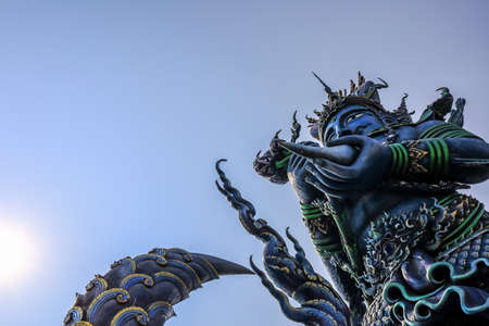Rimkok district,Chiang Rai Province,Northern Thailand on January 19,2020:Angellic Temple Guardians at the entrance pillars of Wat Rong Suea Ten or Blue Temple.のeditorial素材
