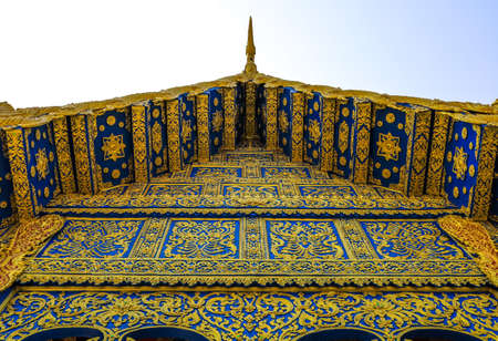 Rimkok district,Chiang Rai Province,Northern Thailand on January 19,2020:Beautiful cobalt blue and gold facade of the main hall of Wat Rong Suea Ten or Blue Temple.のeditorial素材