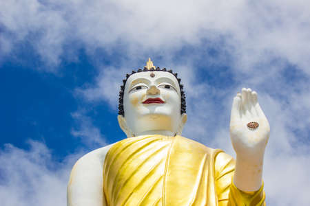 Mae Hia,Chiang Mai,Northern Thailand on Septemmber 13,2019:Standing Buddha Statue at Wat Phra That Doi Kham.のeditorial素材