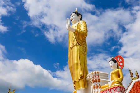 Mae Hia,Chiang Mai,Northern Thailand on Septemmber 13,2019:Standing Buddha Statue at Wat Phra That Doi Kham.のeditorial素材