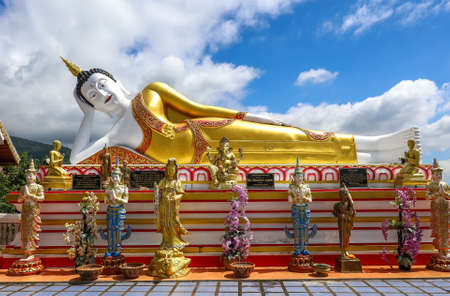 Mae Hia,Chiang Mai,Northern Thailand on Septemmber 13,2019:Reclining Buddha Statue at Wat Phra That Doi Kham.のeditorial素材