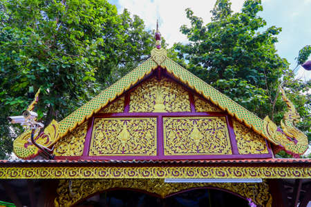 Mae Hia,Chiang Mai,Northern Thailand on Septemmber 13,2019:Beautiful Lanna style roof at  Wat Phra That Doi Kham.のeditorial素材