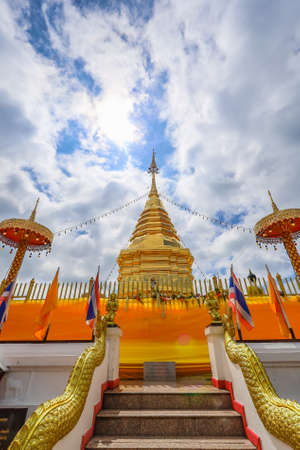 Wat Phra That Doi Kham,Mae Hia,Chiang Mai,Northern Thailand on Septemmber 13,2019:Golden Pagoda,constructed in the year 687,enshrines a sacred relic of the Buddha.のeditorial素材
