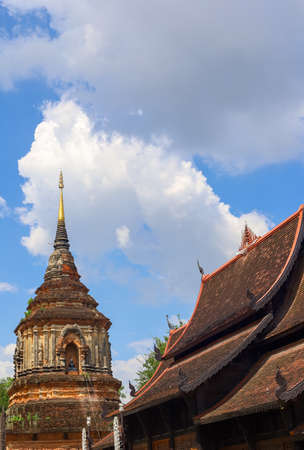 Chiang Mai,Northern Thailand on September 15,2019:Beautiful Lanna style viharn(assembly hall) and old chedi of Wat Lok Moli (Wat Lok Molee).のeditorial素材