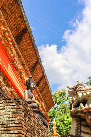 Chiang Mai,Northern Thailand on September 15,2019:Buddha statue around old chedi at Wat Lok Moli (Wat Lok Molee).のeditorial素材
