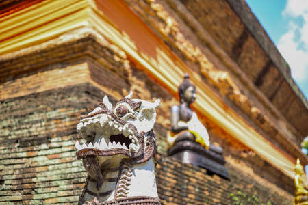 Chiang Mai,Northern Thailand on September15,2019:Lion statue around old chedi at Wat Lok Moli (Wat Lok Molee).のeditorial素材