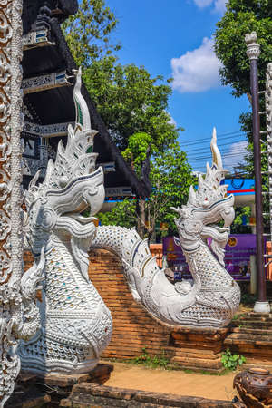 Chiang Mai,Northern Thailand on September15,2019:Finely sculptured Nagas in front of viharn(assembly hall),Wat Lok Molee.のeditorial素材