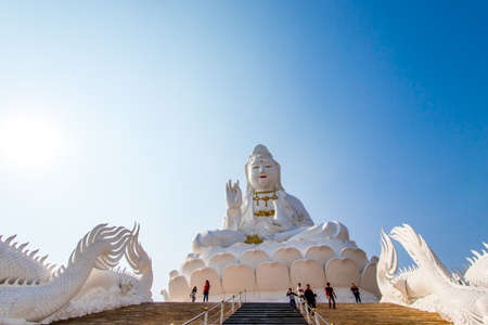 Rimkok district,Chiang Rai Province,Northern Thailand on January 19,2020:Enormous white Guan Yin Statue and beautiful dragon staircases at Wat Huay Pla Kang.のeditorial素材