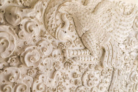 Rimkok district,Chiang Rai Province,Northern Thailand on January 19,2020:Beautiful stucco decorations at the top floor of Guan Yin monument,Wat Huay Pla Kang.(selective focus)のeditorial素材