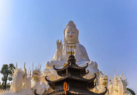 Rimkok district,Chiang Rai Province,Northern Thailand on January 19,2020:Enormous white Guan Yin Statue and beautiful dragon staircases at Wat Huay Pla Kang.のeditorial素材