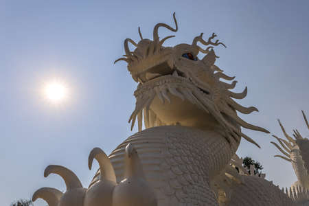 Rimkok district,Chiang Rai Province,Northern Thailand on January 19,2020:Beautiful white dragon sculptures along the staircases leading to large Guan Yin image at Wat Huay Pla Kang.のeditorial素材