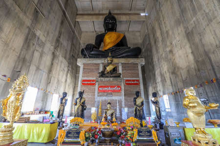 Taling Chan,Bangkok,Thailand on January8,2021:Big black Buddha statue inside new ordination hall(under constructions) of Champa temple.のeditorial素材
