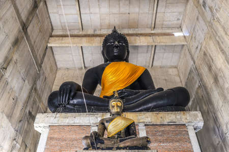 Taling Chan,Bangkok,Thailand on January8,2021:Big black Buddha statue inside new ordination hall(under constructions) of Champa temple.のeditorial素材