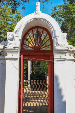 Taling Chan,Bangkok,Thailand on January8,2021:Fence door at the old chapel of Champa Temple.のeditorial素材