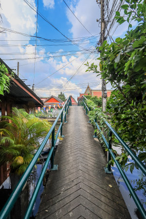 Wat Mondop,Taling Chan,Bangkok,Thailand on November19,2021:The bridge across Khlong Bang Ramat,a canal in Thonburi side of Bangkok.のeditorial素材