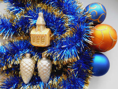 Christmas and New Year decoration balls on a blue tinsel backgroundの写真素材