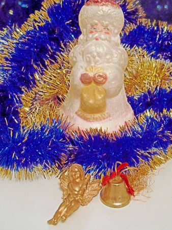 Christmas and New Year Santa Claus on a background blue tinselの写真素材