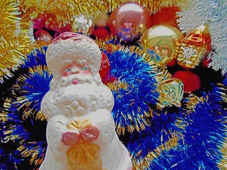 Christmas and New Year Santa Claus on a background blue tinselの写真素材